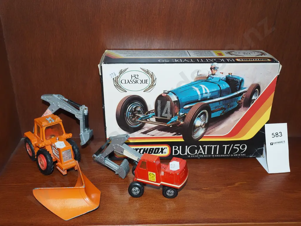 yet to be assembled Matchbox scale model of Bugatti, 2x toy diggers Image 1++