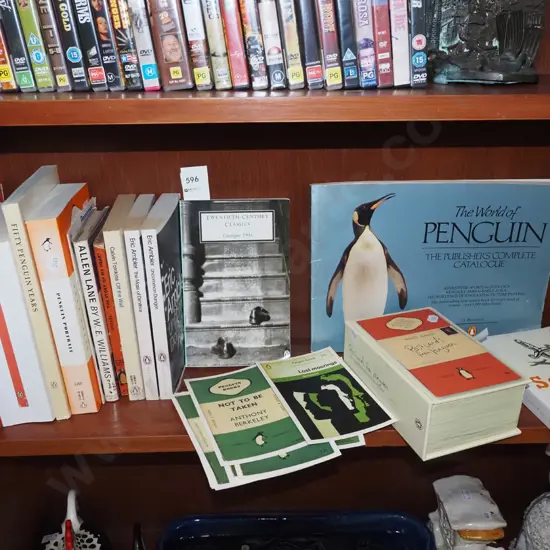 shelf of Penguin books, box of postcards - Penguin books
