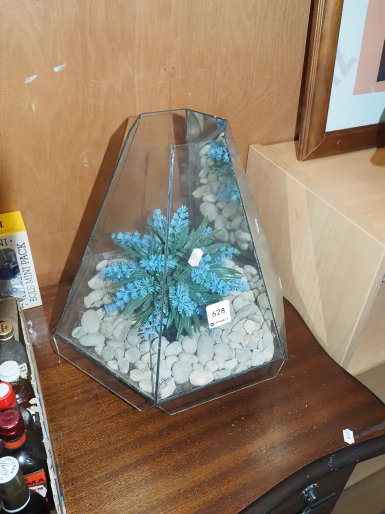 glass terrarium with stones and faux flowers Image 1++