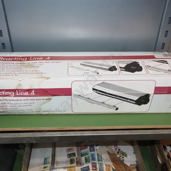 boxed as new old stock retractable clothesline