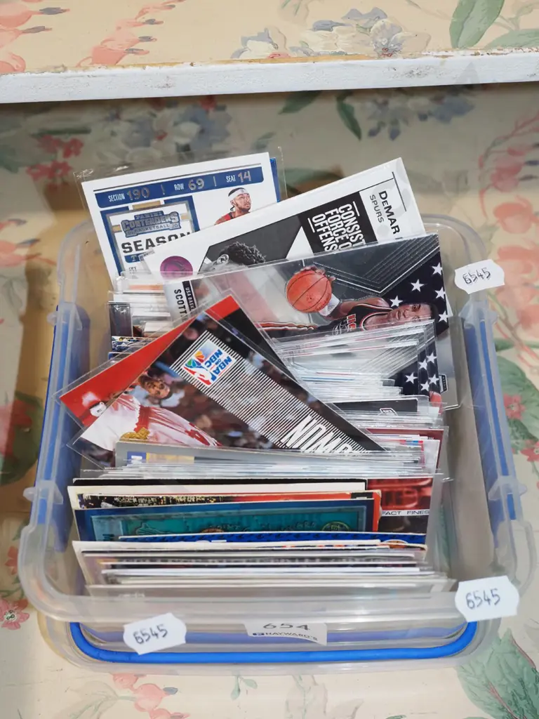 tub of basketball collector cards Image 1++