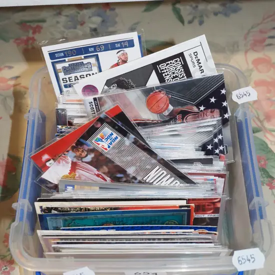tub of basketball collector cards