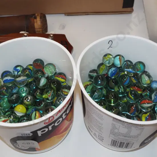 2x containers of marbles