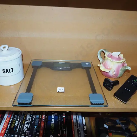 lidded salt canister, kitchen scales, tea pot, car phone hands free kit