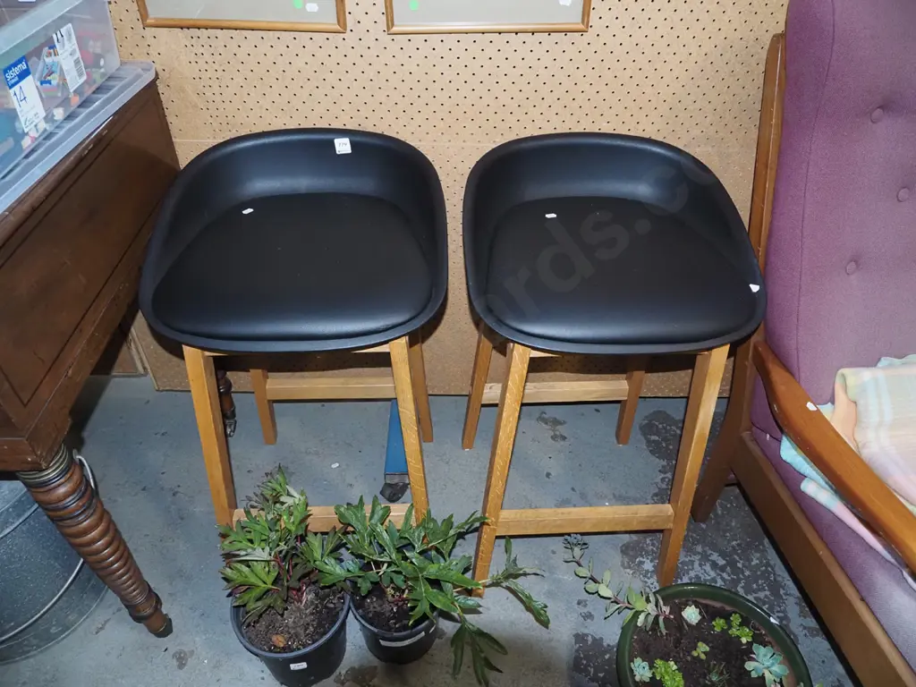 pair of vinyl, plastic and wood bar stools Image 1++