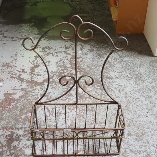 wrought metal wall mounted plant basket