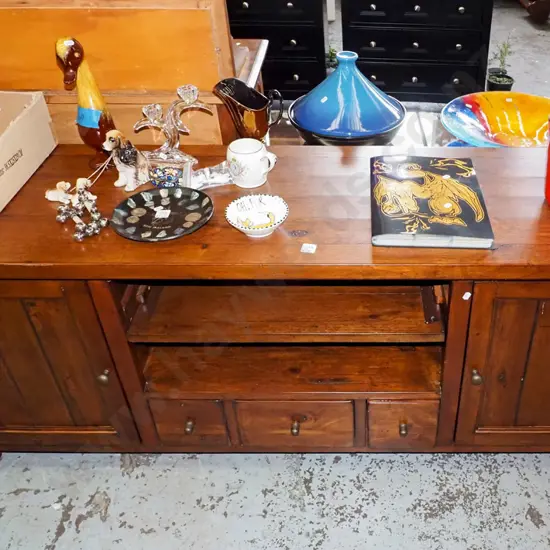 solid wood entertainment unit with 2 doors, 3 drawers, cast metal knobs H650 W1600 D450