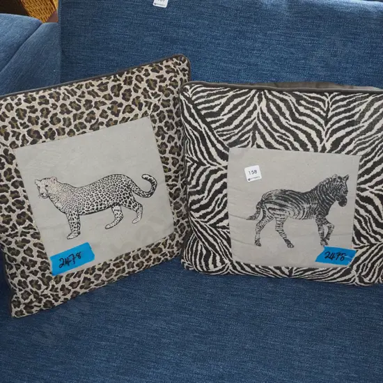 2x cushions - cheetahs, zebra