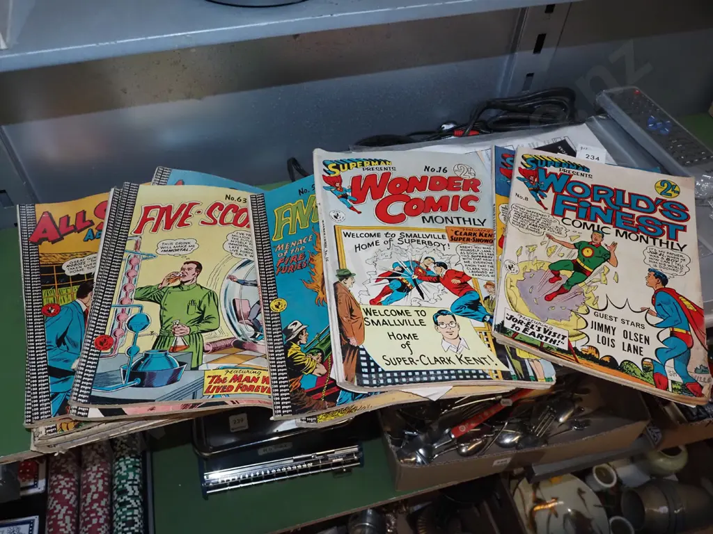 stack of comic books Image 1++