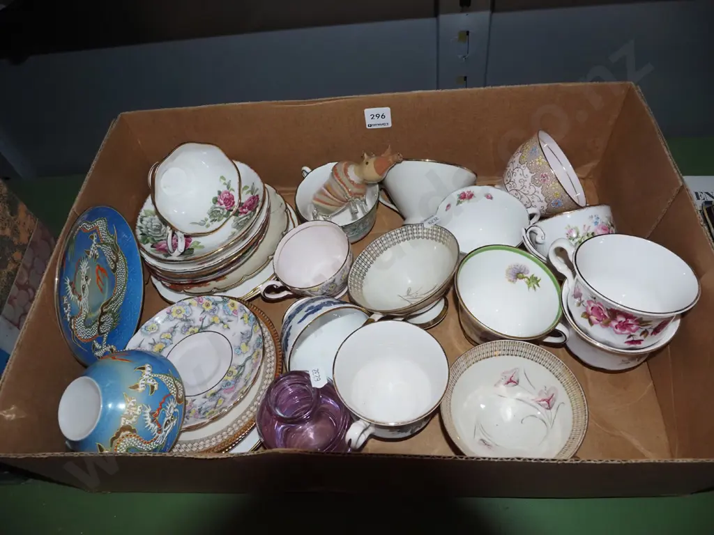 box; cups, saucers, glass and sand rhinoceros Image 1++