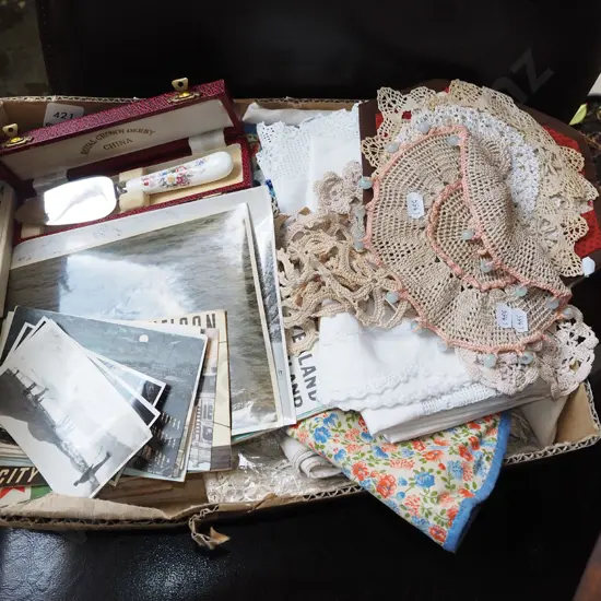 box; hand worked linen, doilies, postcards etc