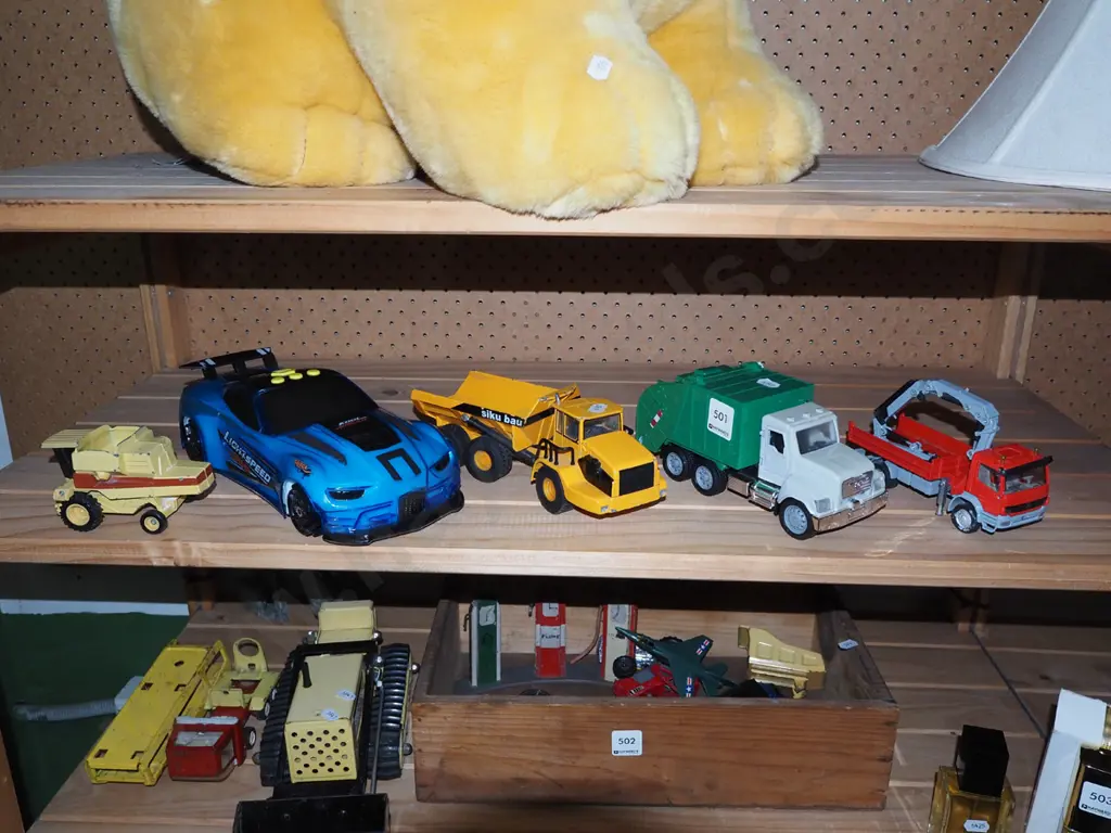 shelf of toy vehicles Image 1++