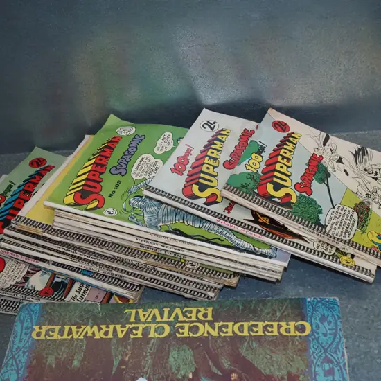 stack of Superman comics