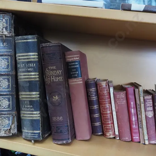 shelf; bibles, David Copperfield etc
