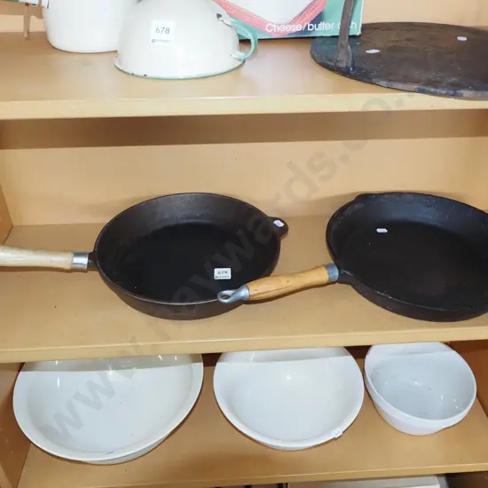 2x cast iron wooden handled frying pans Widest 300