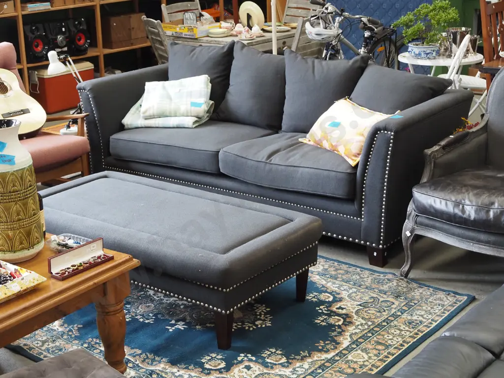 contemporary charcoal upholstered and dome edged chesterfield  3 seater settee with matching ottoman Image 1++