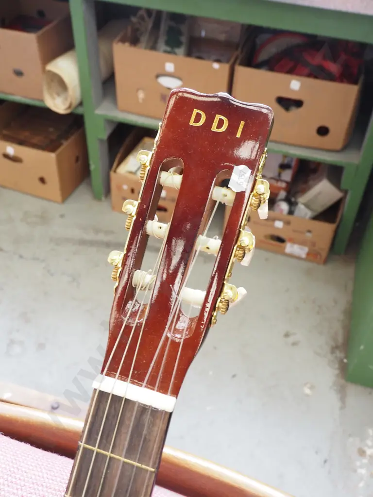 DDI brand acoustic guitar - fret ends need attention, very sharp, need filing Image 1++