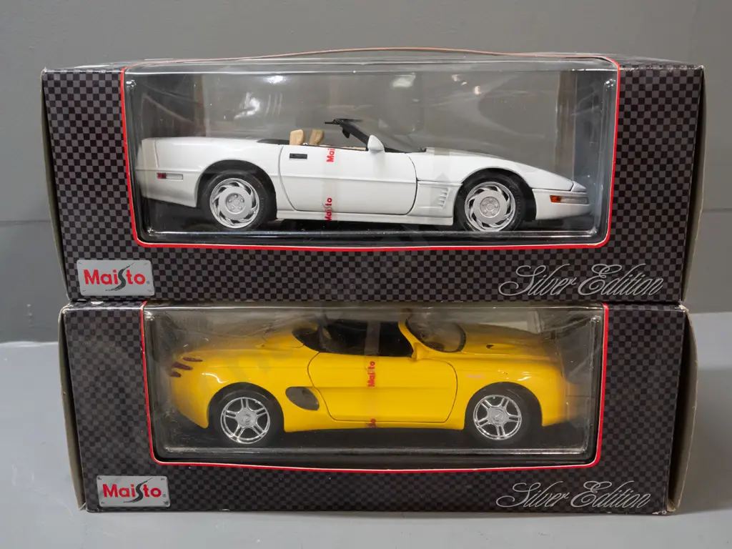 2 Maisto Silver Edition 1:18 scale die-cast model cars in original boxes - 1996 Corvette and a Mustang Mk3 Image 1++