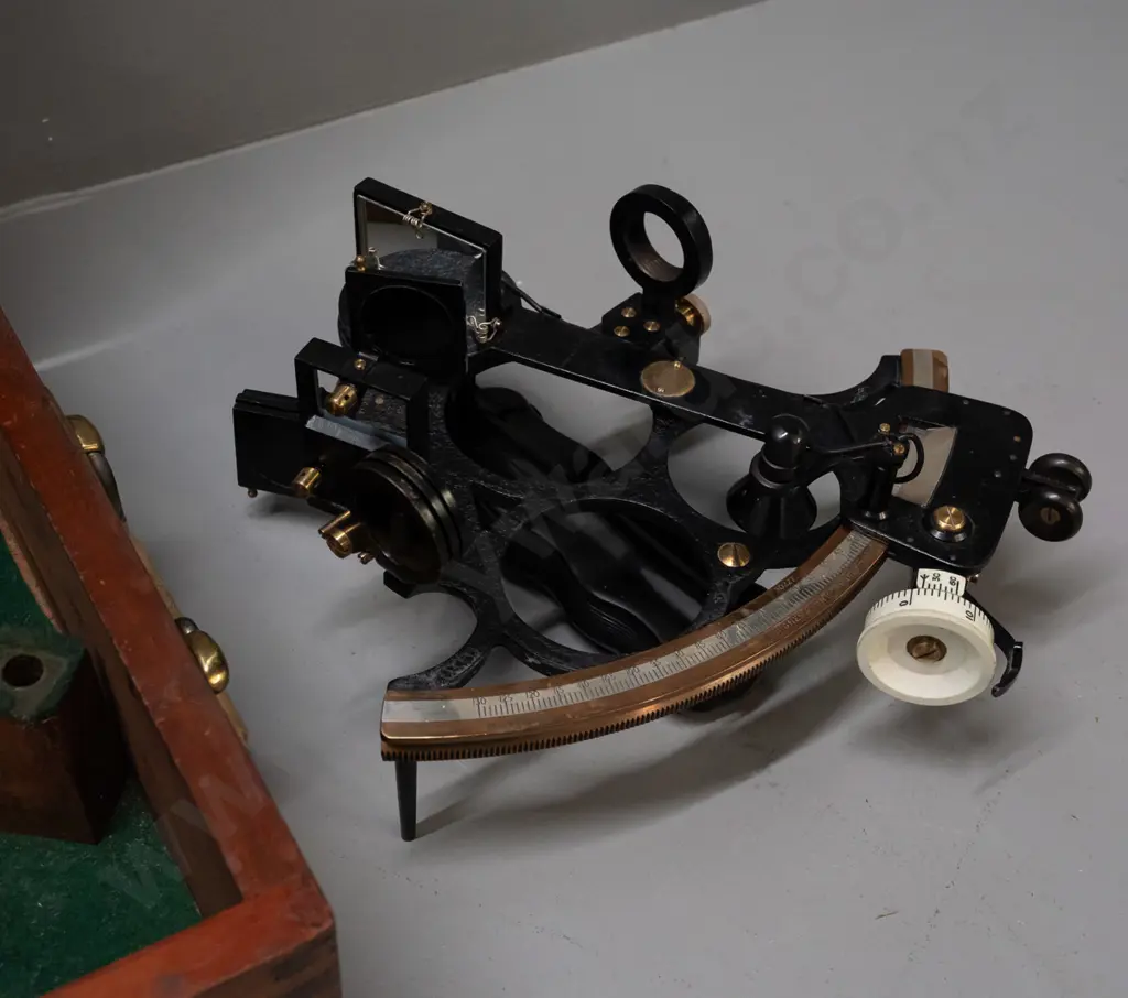 vintage sextant in fitted timber case with Husun / London marks, with eyepieces and accessories, case lockable, has key. Image 1++