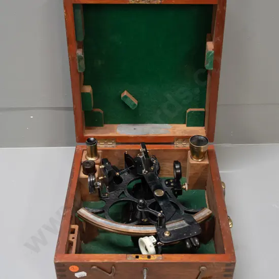 vintage sextant in fitted timber case with Husun / London marks, with eyepieces and accessories, case lockable, has key.
