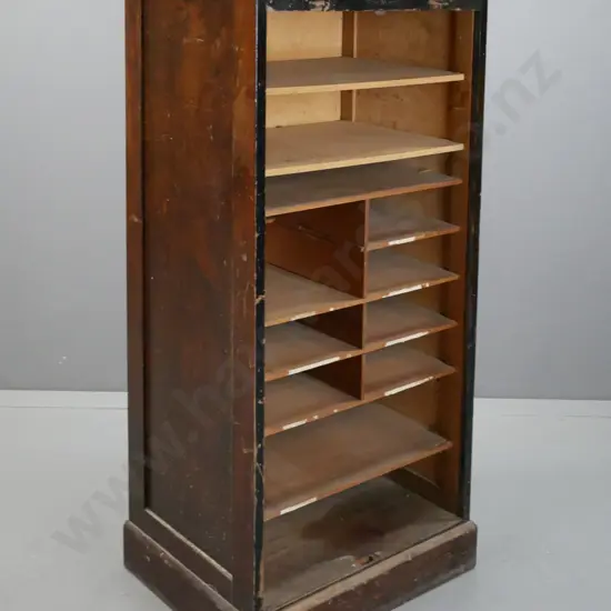 Vintage beech & rimu black-painted front sliding tambour-fronted cupboard exposing shelf system, 2 replaced shelves. One
