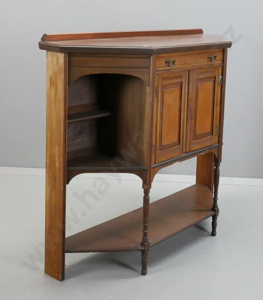 Edwardian walnut sideboard, one drawer, two panelled doors, shelves in canted sides, on turned feet w/platform base, Image 1++