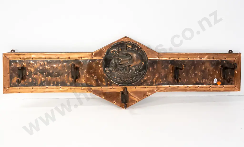 vintage wall mount coat rack - beaten copper over timber, with central applied galleon motif decoration, 5 cast metal Image 1++
