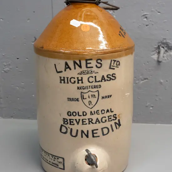 Lane's Dunedin stoneware crock with wire handle, metal spigot, Pearson's Whittington Moor Chesterfield maker's mark.