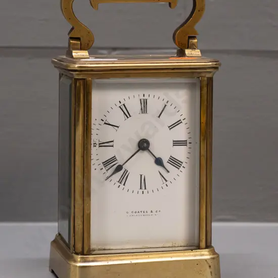 vintage brass-cased carriage clock - porcelain face marked G. Coates & Co. Christchurch NZ, w/ bevelled glass sides,