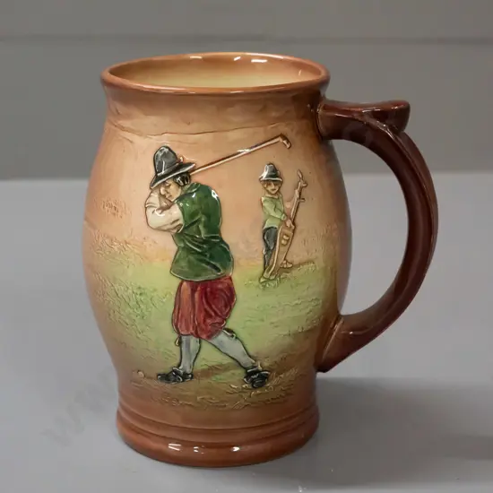 Royal Doulton Kingsware golfing jug - light brown background. H-145 W-120 at handle