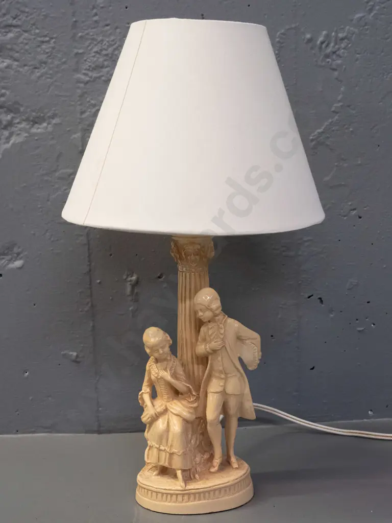 composite lamp base with Italian style fluted column & romance scene with plain conical shade - going, has a few small Image 1++