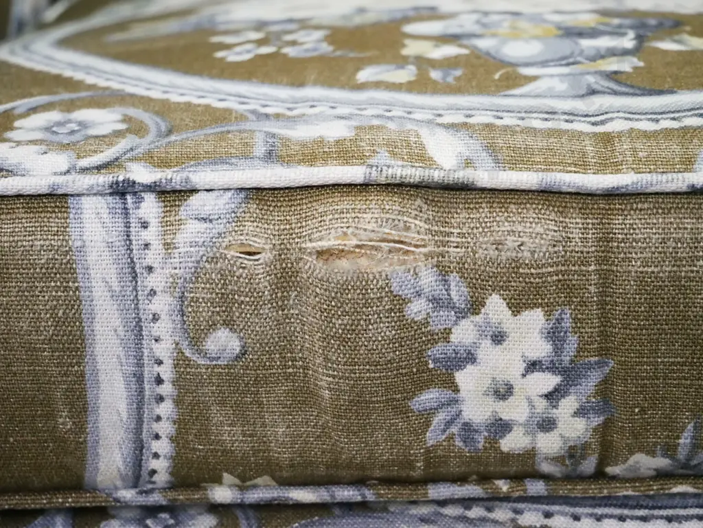 pair of mid-century floral upholstered rolled arm wingback chairs on short cab legs. Wear to top of one wing, some Image 1++