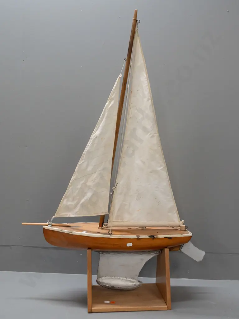wooden pond yacht with sail on rimu stand, corrosion & deterioration to deck, staining to sail H-880 L620 Image 1++