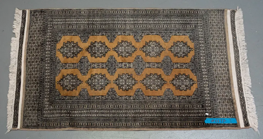 woolen floor rug, geometric boarders, mustard, blues & black colours, light weave & some fading L1520 W940 Image 1++