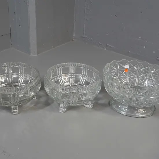 3 moulded clear glass bowls - pair of 4-footed deco banded pattern fruit or salad bowls and a larger round-footed oval