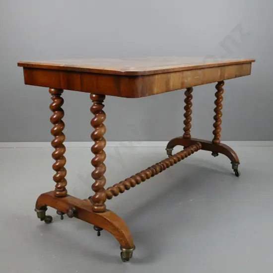 Regency rosewood library or side table w/ twin Jacobean-style twist supports & central refectory base, on large brass