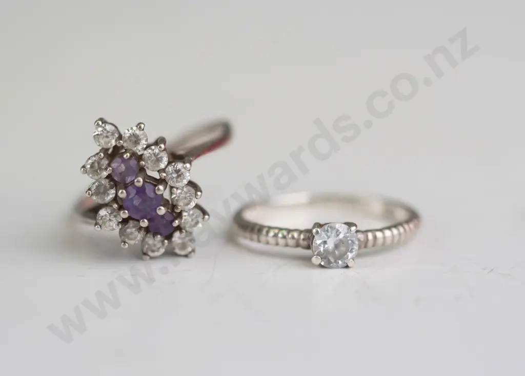 2 silver cz rings both stamped 925 Image 1++