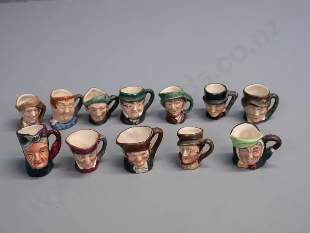 12 miniature character jugs, all Royal Doulton except one Sterling England - approx. H-40 Image 1++