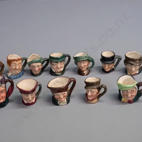 12 miniature character jugs, all Royal Doulton except one Sterling England - approx. H-40