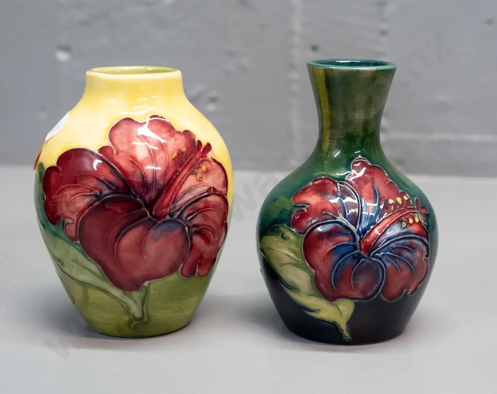 2 small Moorcroft floral vases with paper labels - both approx. H-95 Image 1++
