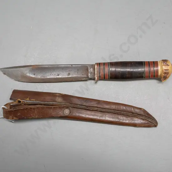 vintage hunting knife in leather sheath, blade marked Alfred Williams Sheffield, handle made of antler, wood and brass -