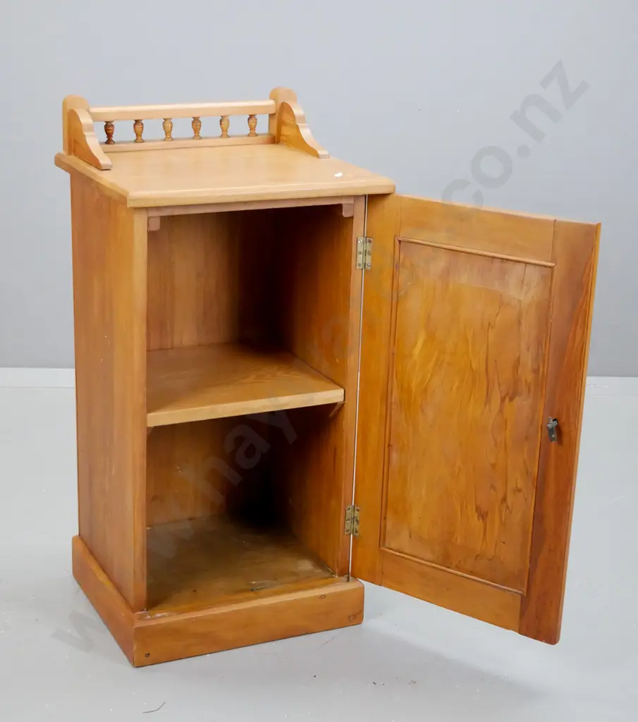 Edwardian rimu bedside cabinet with panelled door, shaped gallery with spindles - borer in bottom plate, filled borer Image 1++