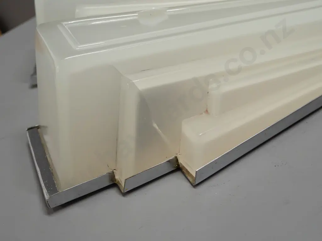 pair of art deco wall mount light fittings with faceted triangular semi-opaque glass shades, chrome backing plates. One Image 1++