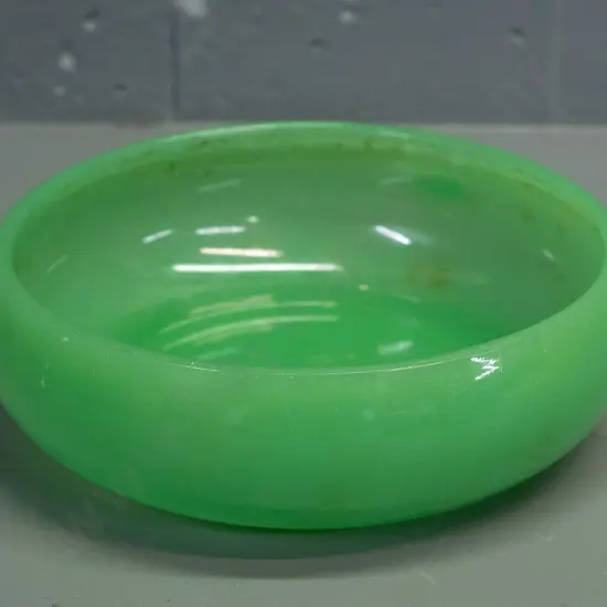 opaque green uranium glass float bowl - minor staining inside, scratches to underside of base. D-170