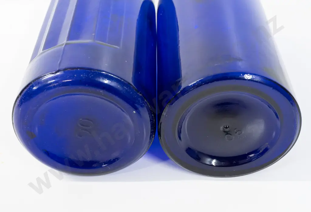 2 large Bristol blue glass bottles, one marked Poison on shoulder H-340, other with faint scratched markings, Image 1++