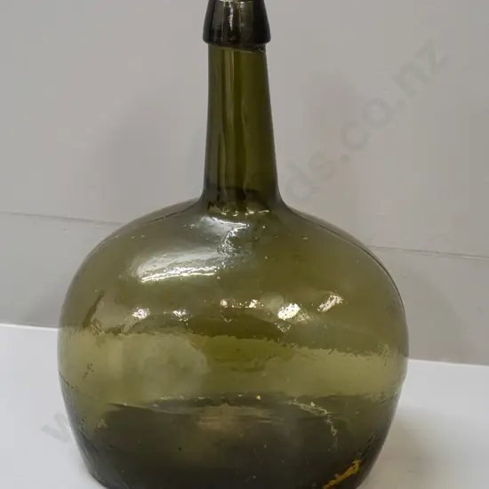 large green glass bottle - squat oval shape H-330 W-220
