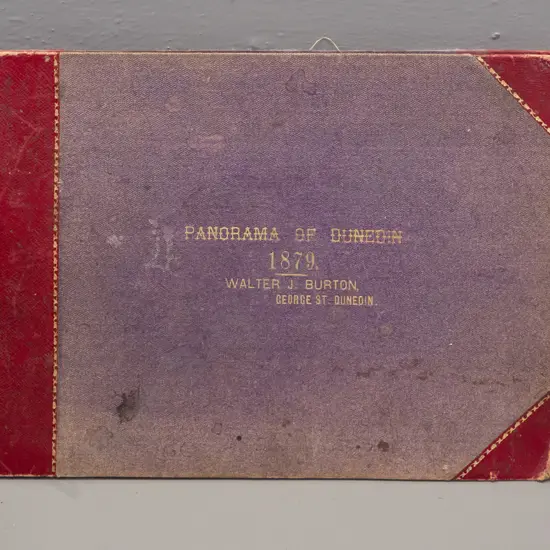 vintage hard cover folio-bound photographic Panorama of Dunedin - 1879 Walter J. Burton. Photos have uneven fading, wear