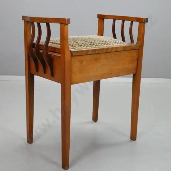 arts & crafts style vintage piano stool in beech with upholstered lift up lid, fraying to gimp around edge