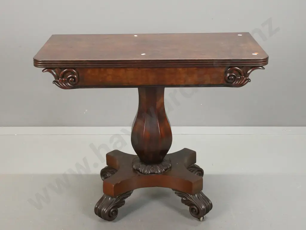 WIlliam IV mahogany tea / game table with swivel fold out top over storage cavity, faceted bolster column on 4-point Image 1++