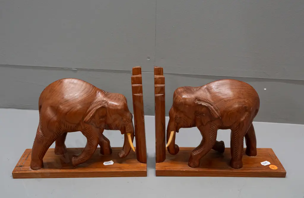 pair of carved teak elephant book-ends with stepped ends, timber tusks H-180 L-230 W-85 Image 1++